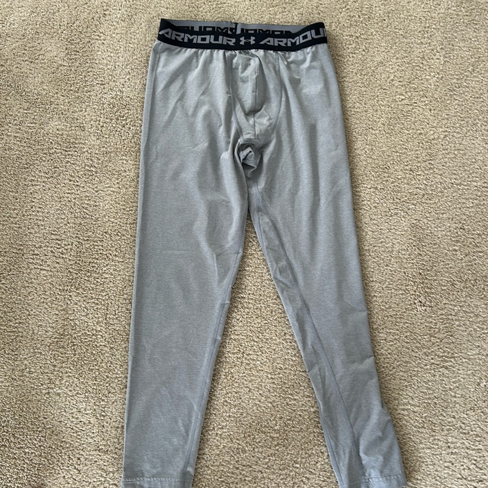 Under Armour gray leggings, fitted heat gear. Youth XL